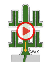 湯口部を下にして圧力釜に入れ、蒸気で加熱と加圧を行い中のワックス溶かし出します。